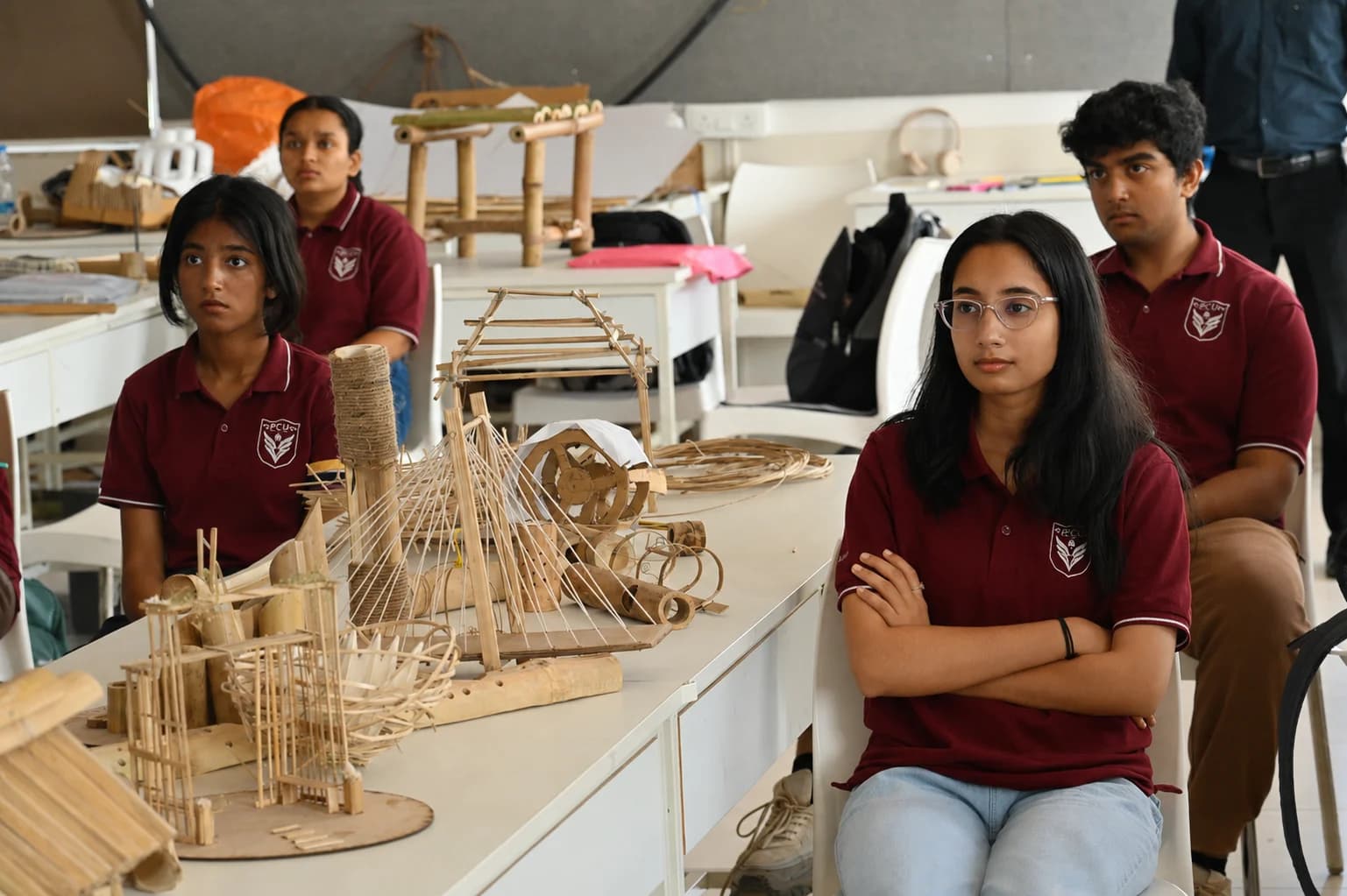 Interior & Space Design students in the studio with bamboo structural models