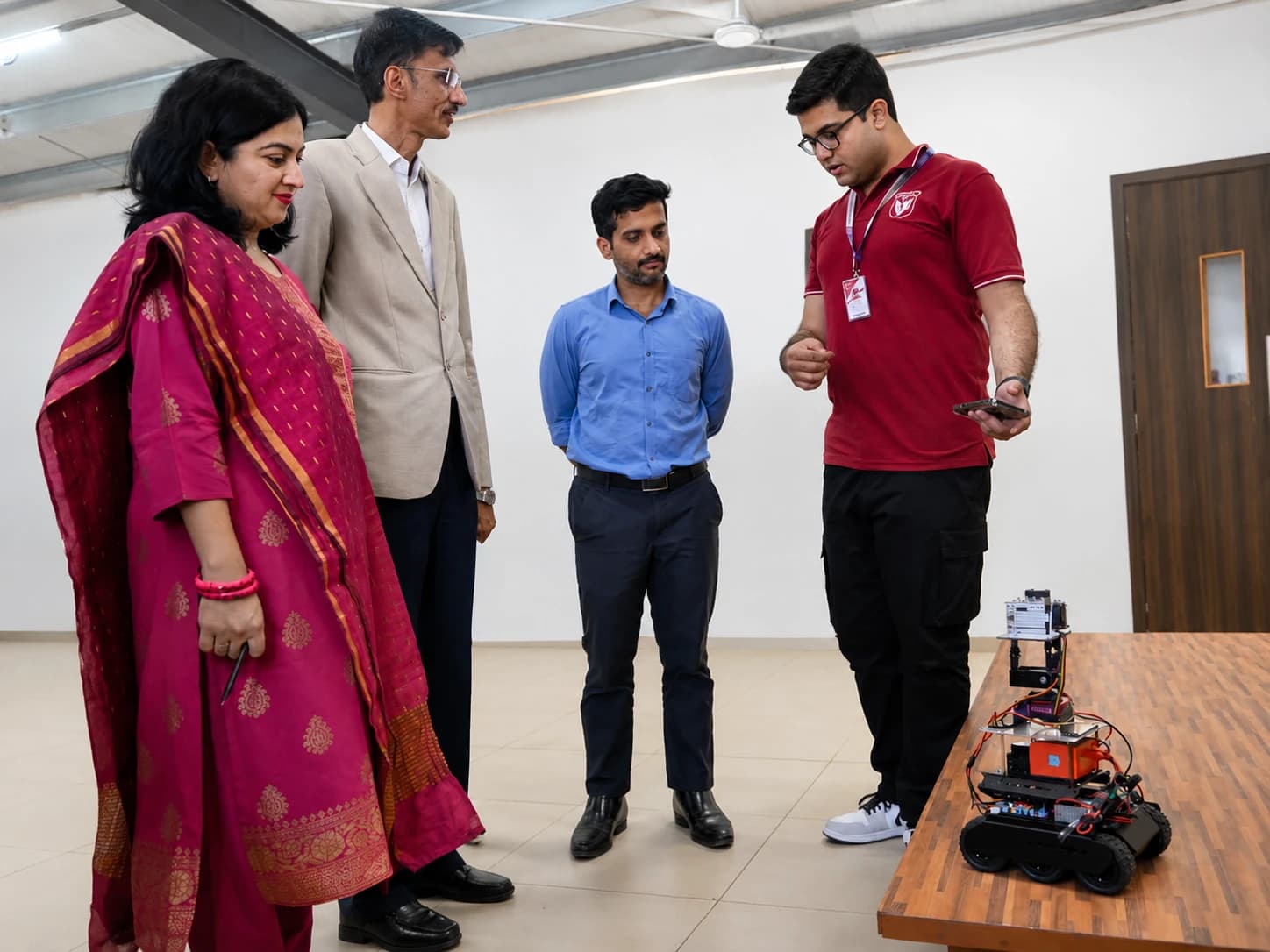 Faculty and Ph.D. scholars collaborating on robotics research