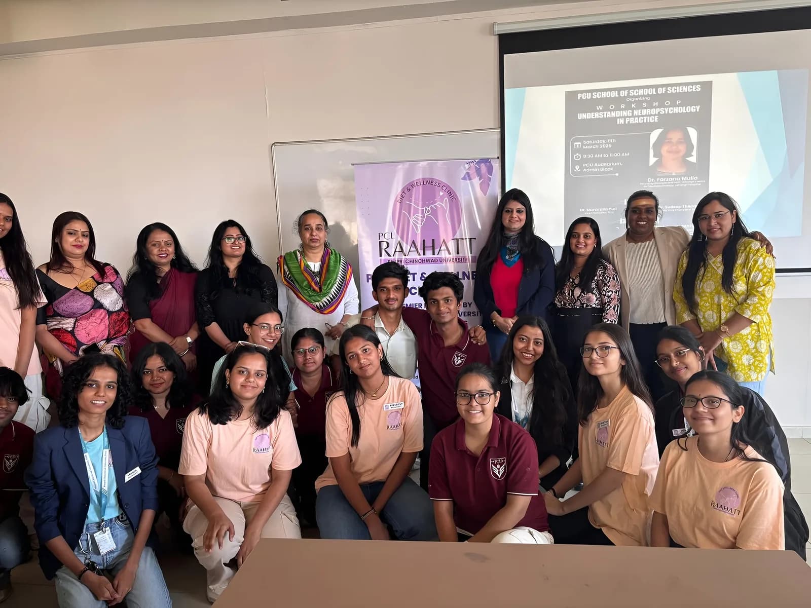 Students and faculty at a PCU Raahatt wellness event