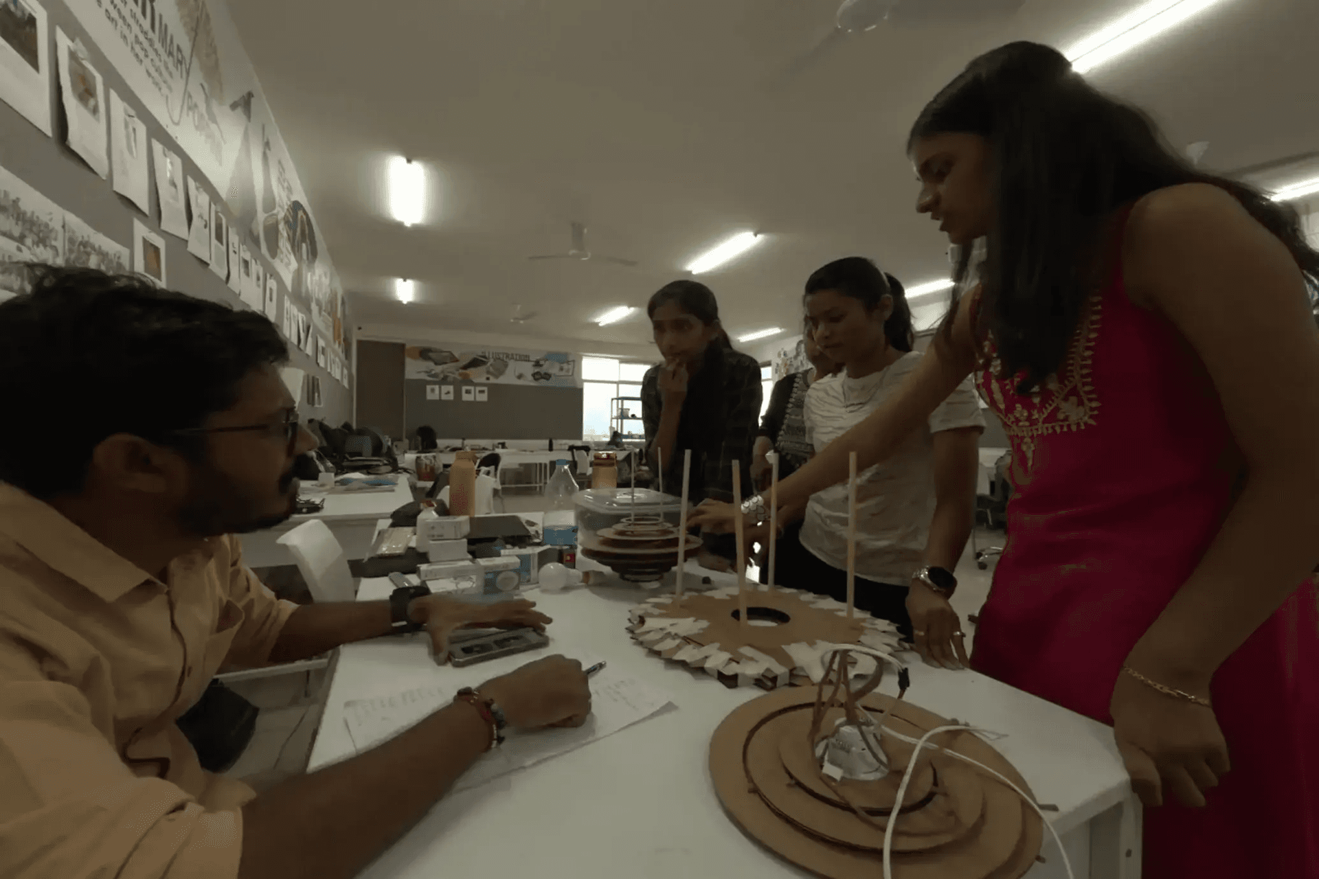 Students building a circular design model
