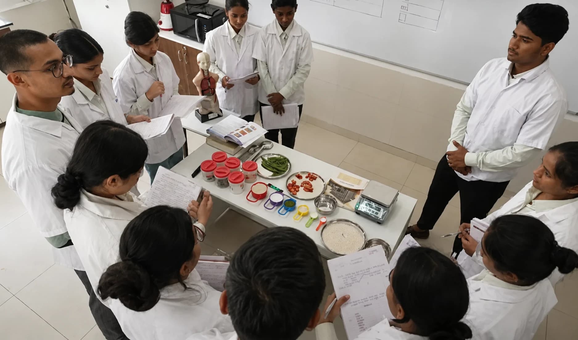 Science scholars collaborating in a laboratory practical session
